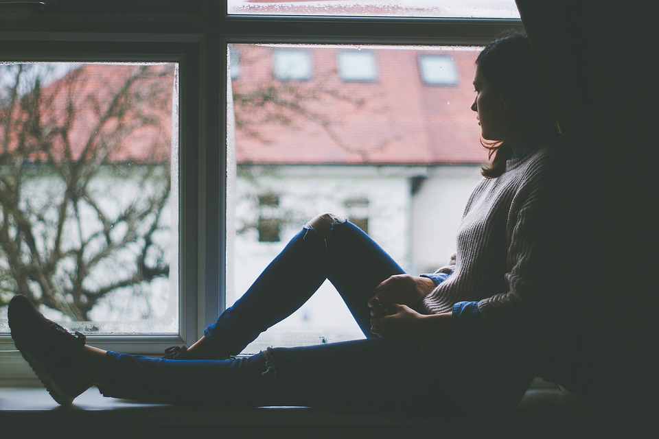 girl sitting alone