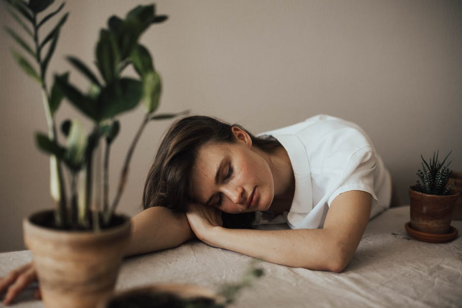 A woman passes out from exhaustion due to burnout.