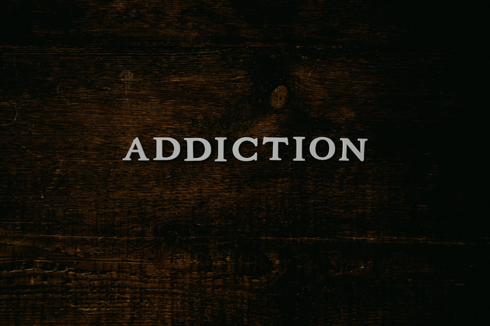 ‘Addiction’ written on wood before getting anxiety counseling in Barrow County.