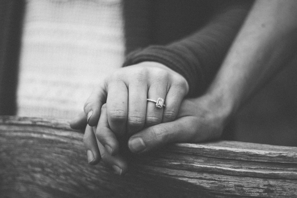 A couple holding hands after anger management counseling in Barrow County