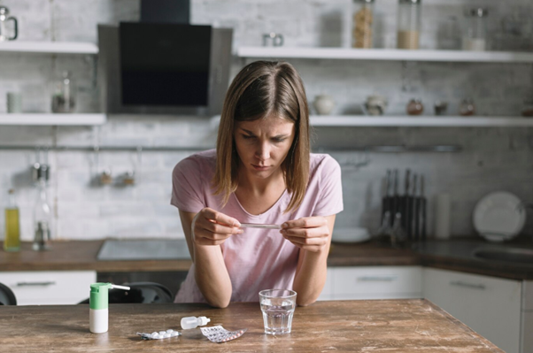 a woman with medicines