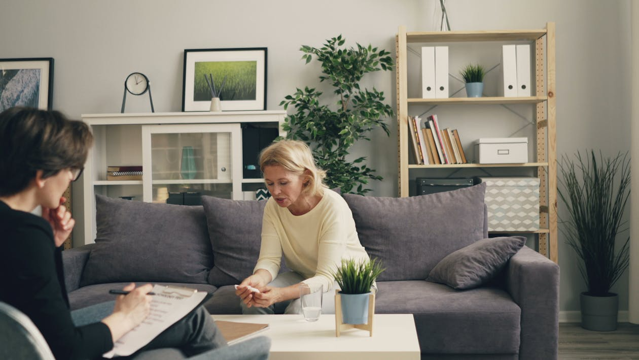 A woman talking to a therapist